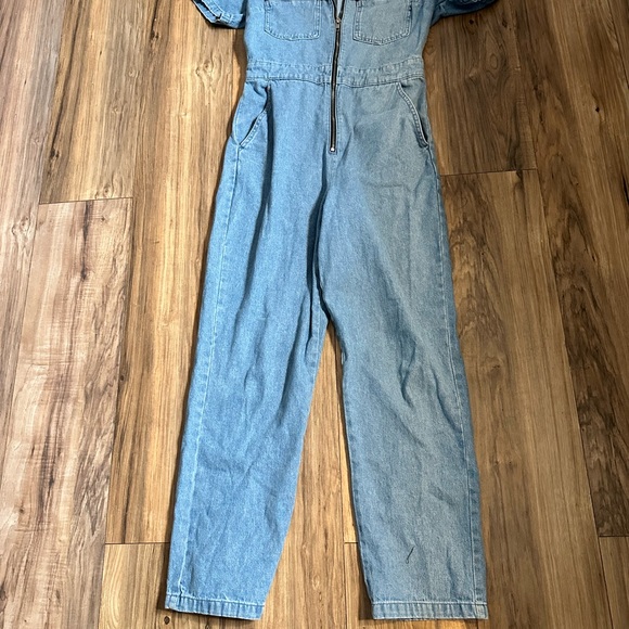 Topshop is a store the TV star often heads to. denim jumpsuit, - Picture 4 of 8